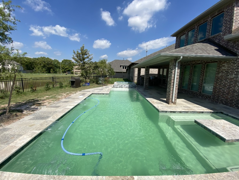 Green city water in a Houston backyard pool before ozone purification